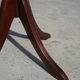 Small side table with an oval top in English style.