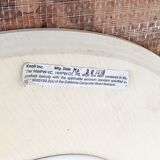 Round table in red marble by Eero Saarinen for Knoll