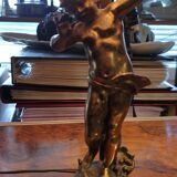 Brass cherub-laying lamp