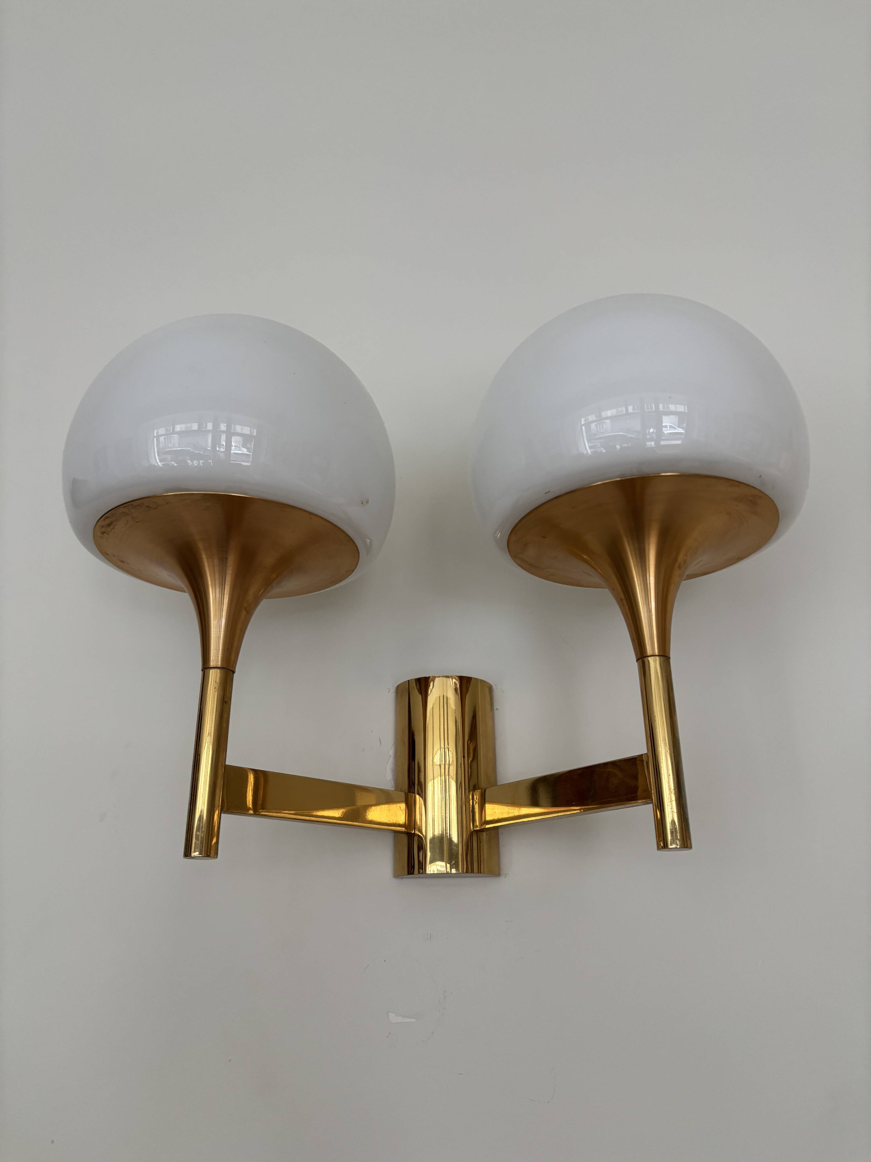Golden metal wall light and opaline, 1970