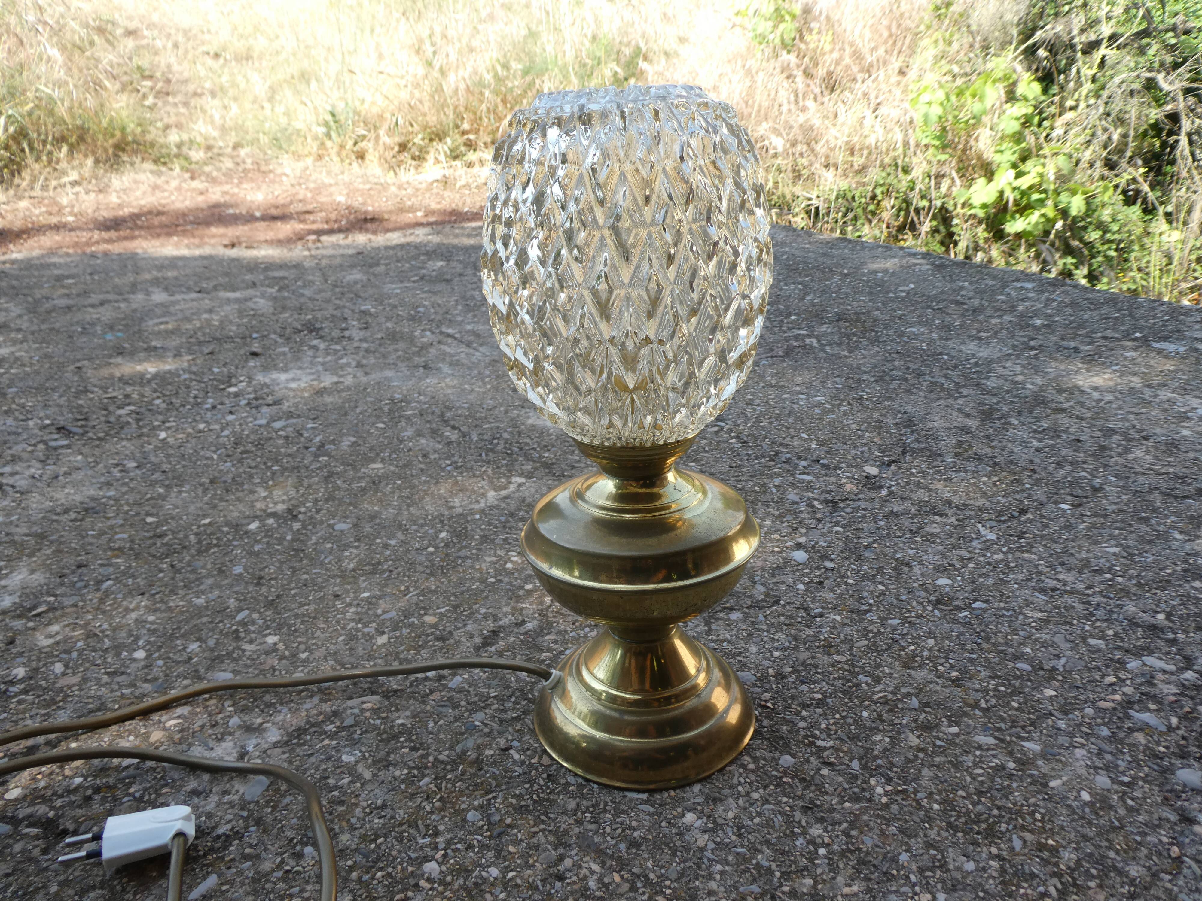 Vintage table lamp with chiseled glass globe.