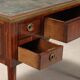 Neoclassical writing desk made of violet wood, 18th century.
