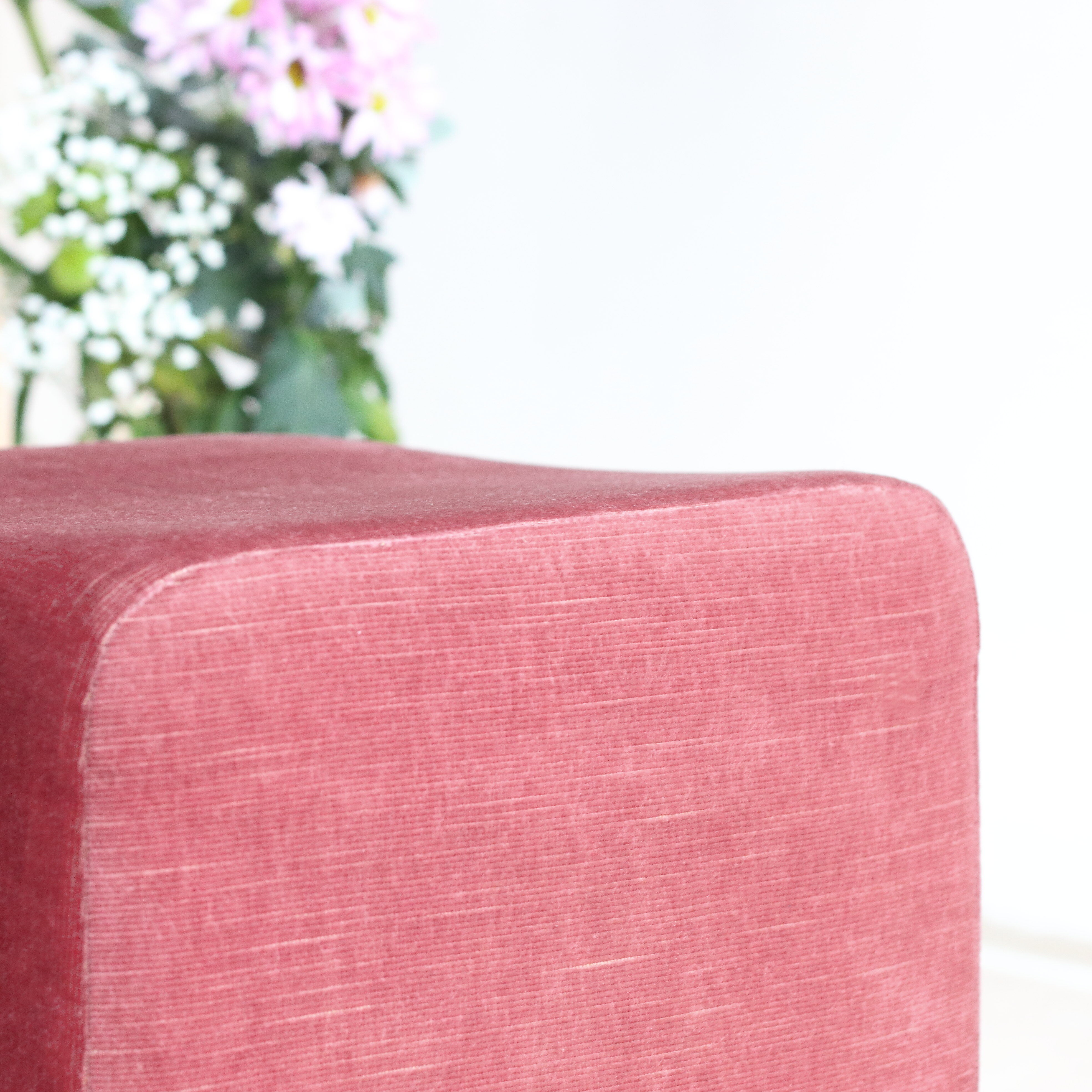 Pink velvet pouf with fringes