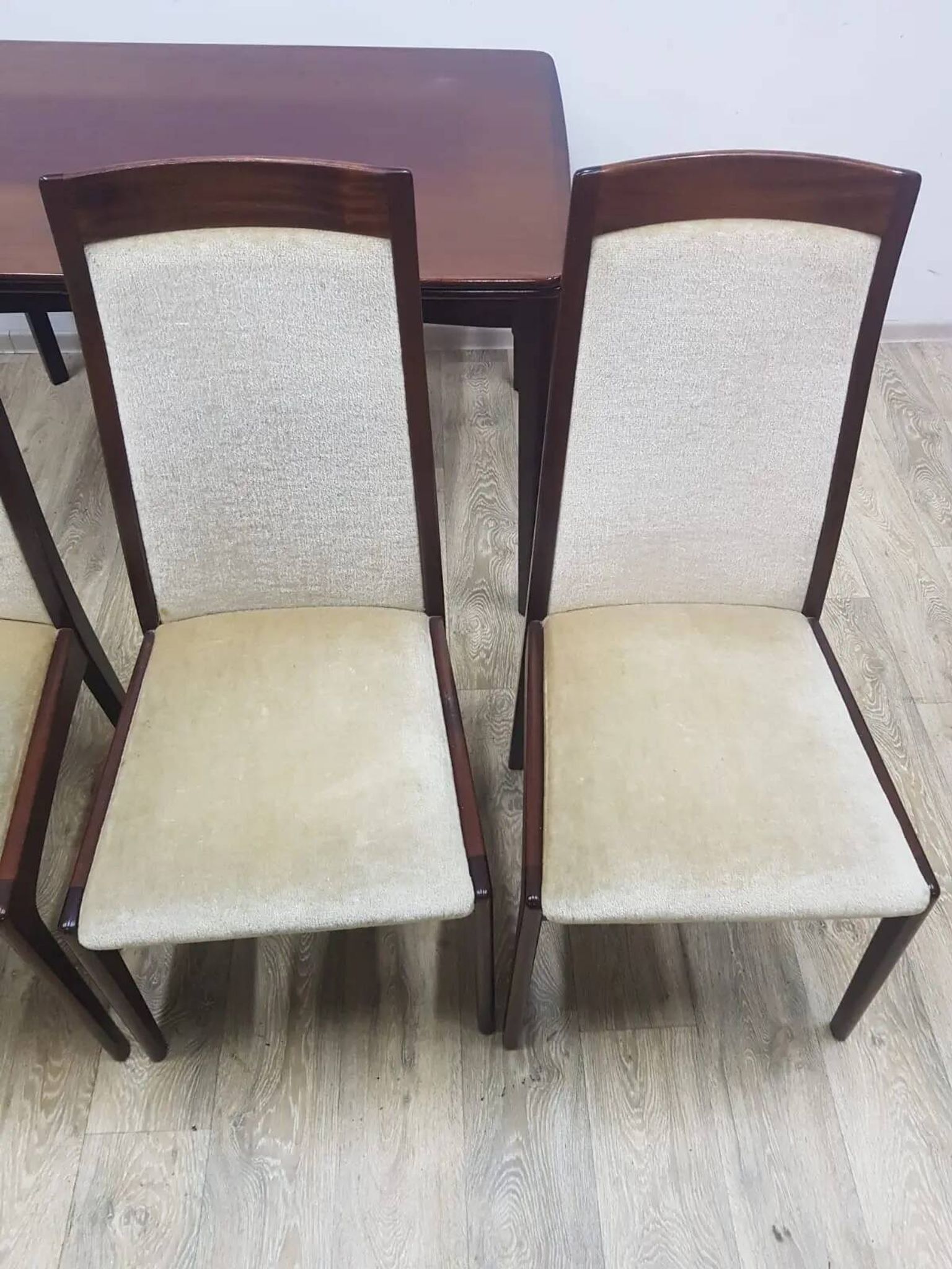 Table and four chairs set, brown wood, beige fabric, Denmark, 1970s.