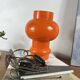 Lampe de table globe en verre opaline orange