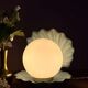 Vintage lamp in the shape of a shell in blue and opaline ceramic.