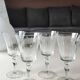 Set of 8 glasses with flared neck, in crystal. With frosted plant decoration. Height 16 cm
