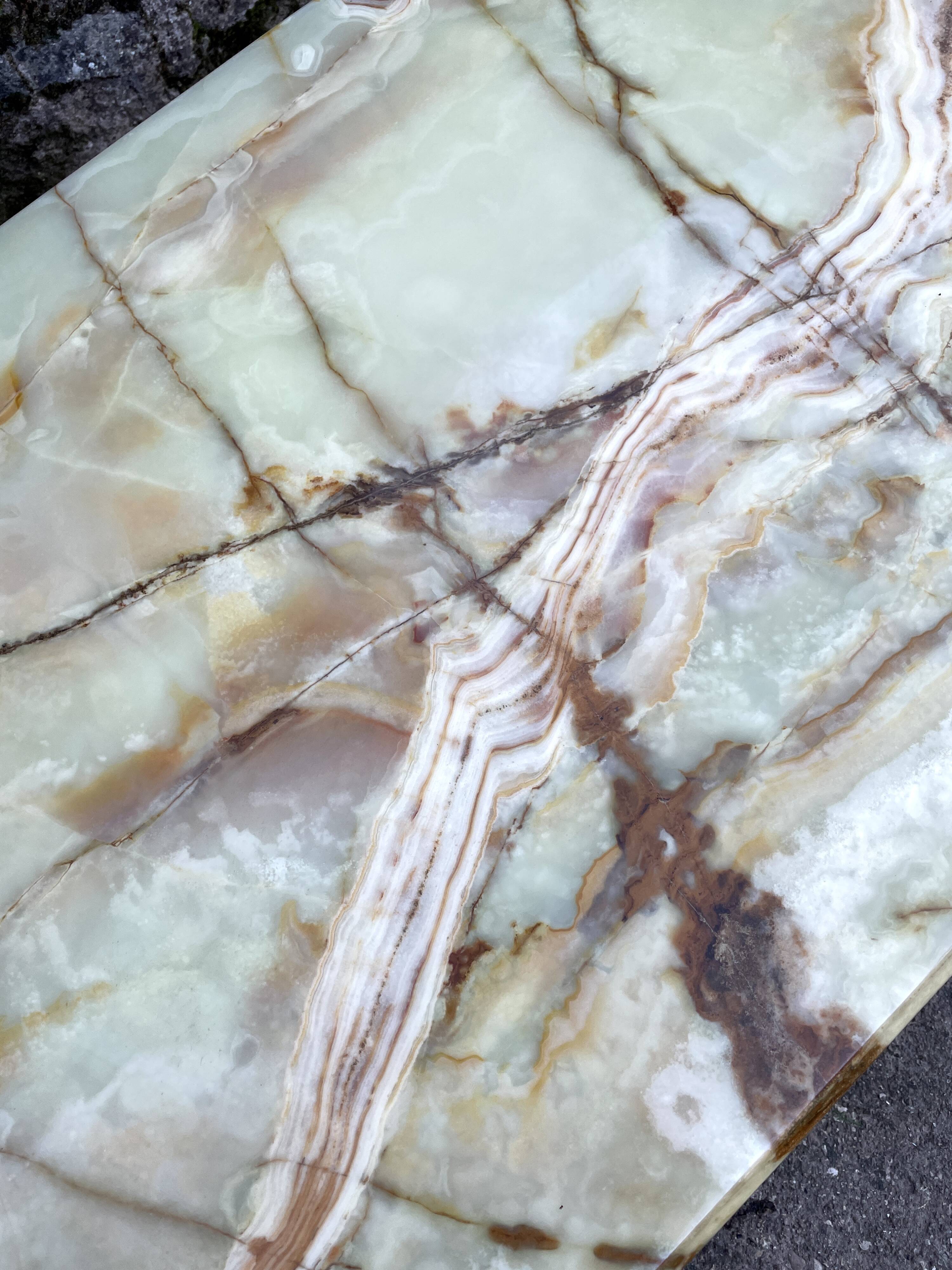 Louis XVI style oval coffee table in onyx and gilt brass