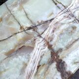 Louis XVI style oval coffee table in onyx and gilt brass