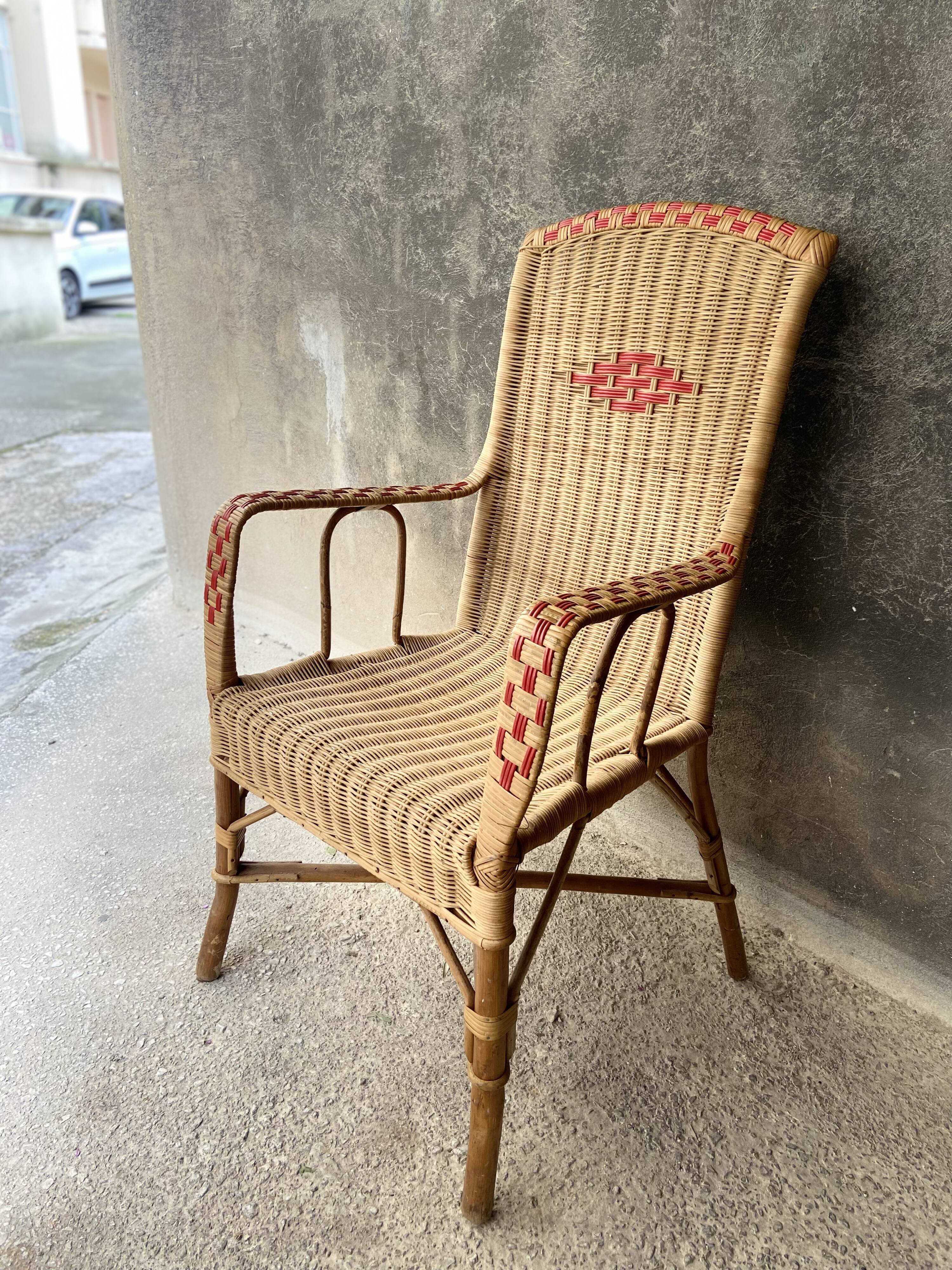Vintage braided rattan armchair
