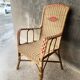 Vintage braided rattan armchair