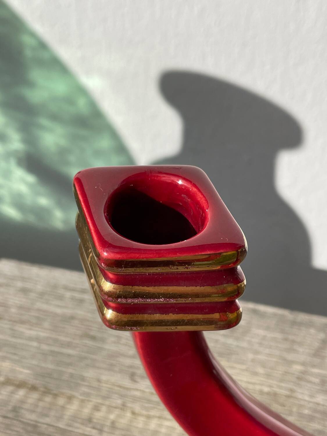 Art Deco burgundy red ceramic candlestick