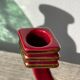 Art Deco burgundy red ceramic candlestick