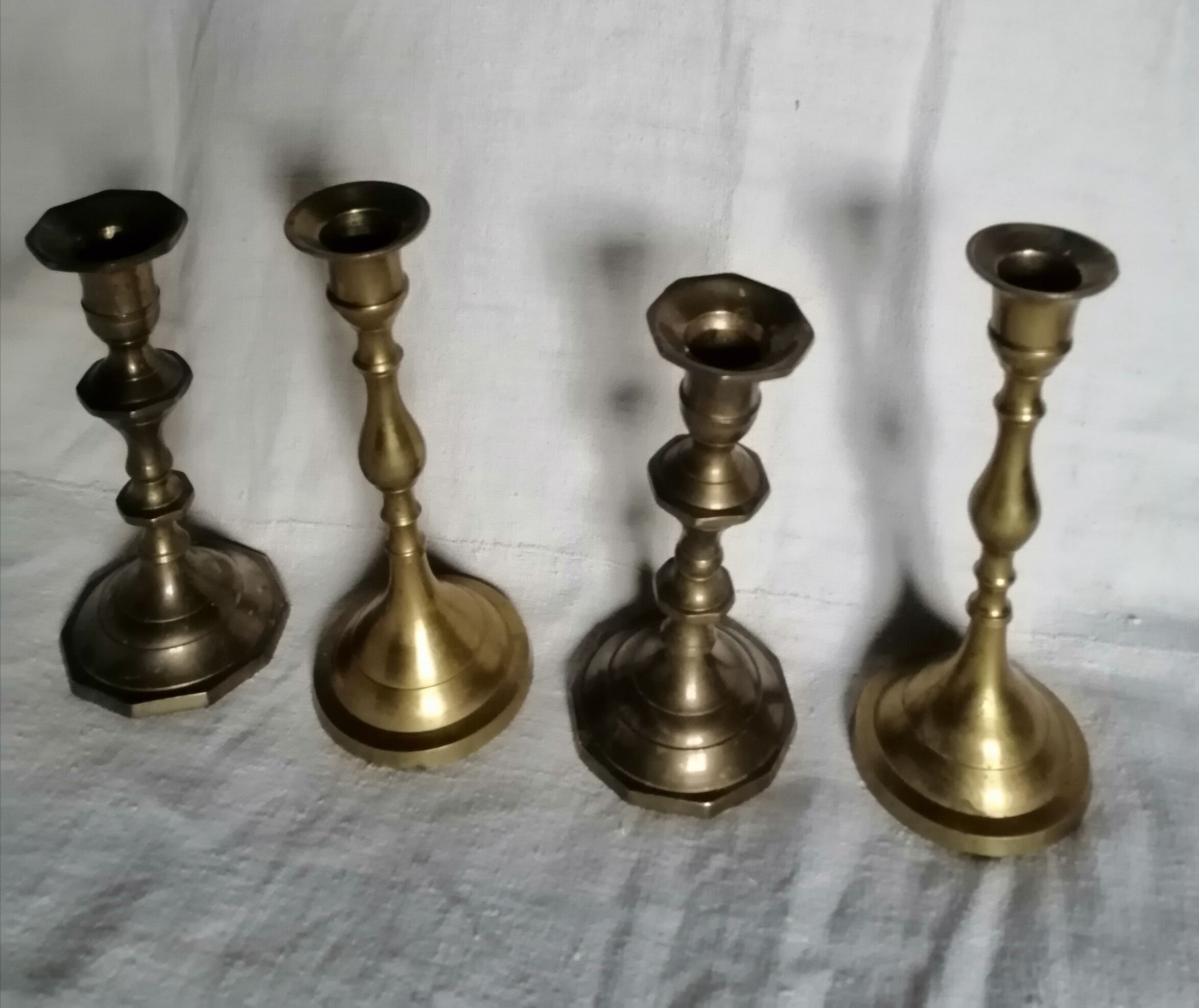 Set of 4 brass candle holders