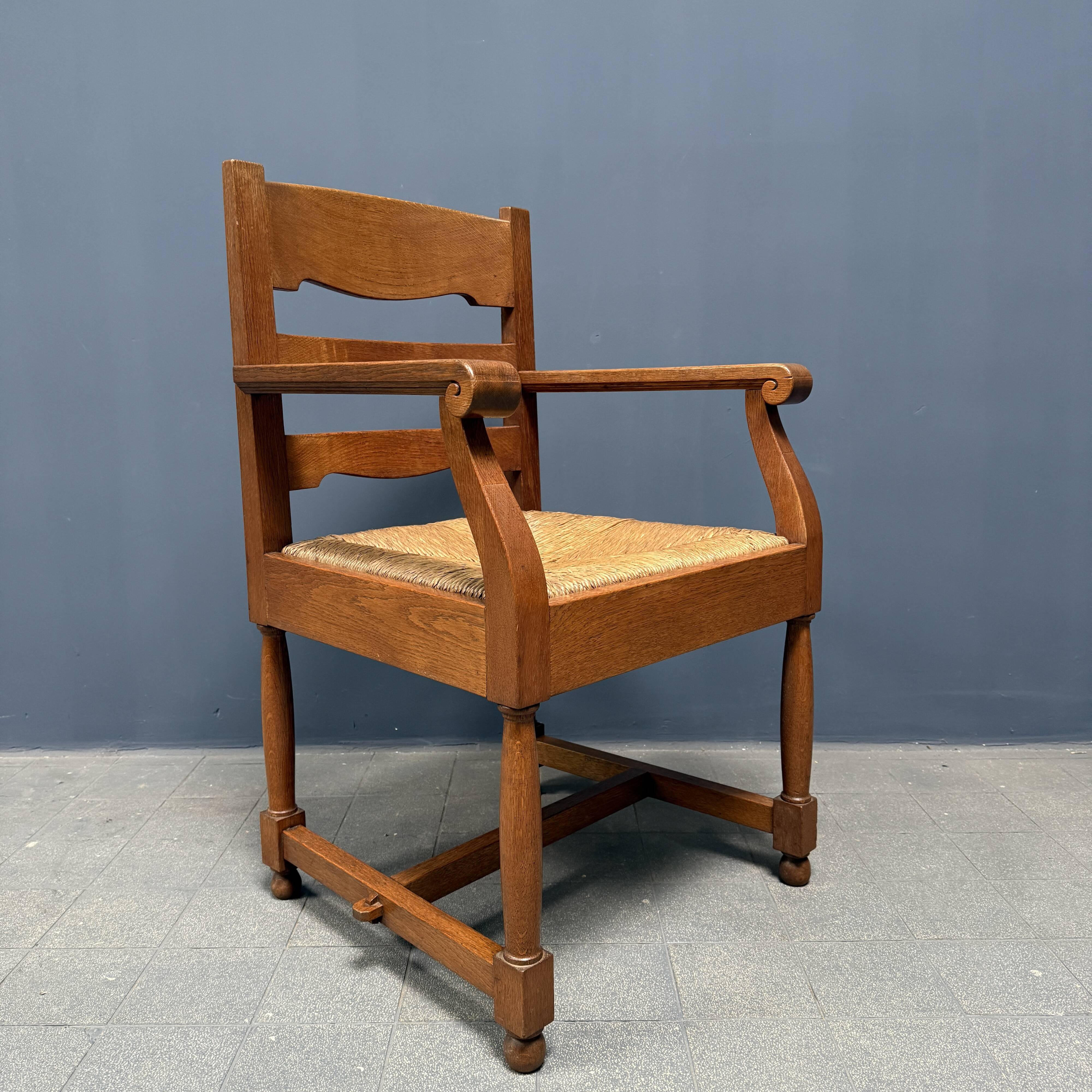 Set of two Dutch oak armchairs with rush seats
