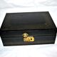 Vintage jewelry box in black leather and red interior