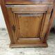 Antique wardrobe standing man
