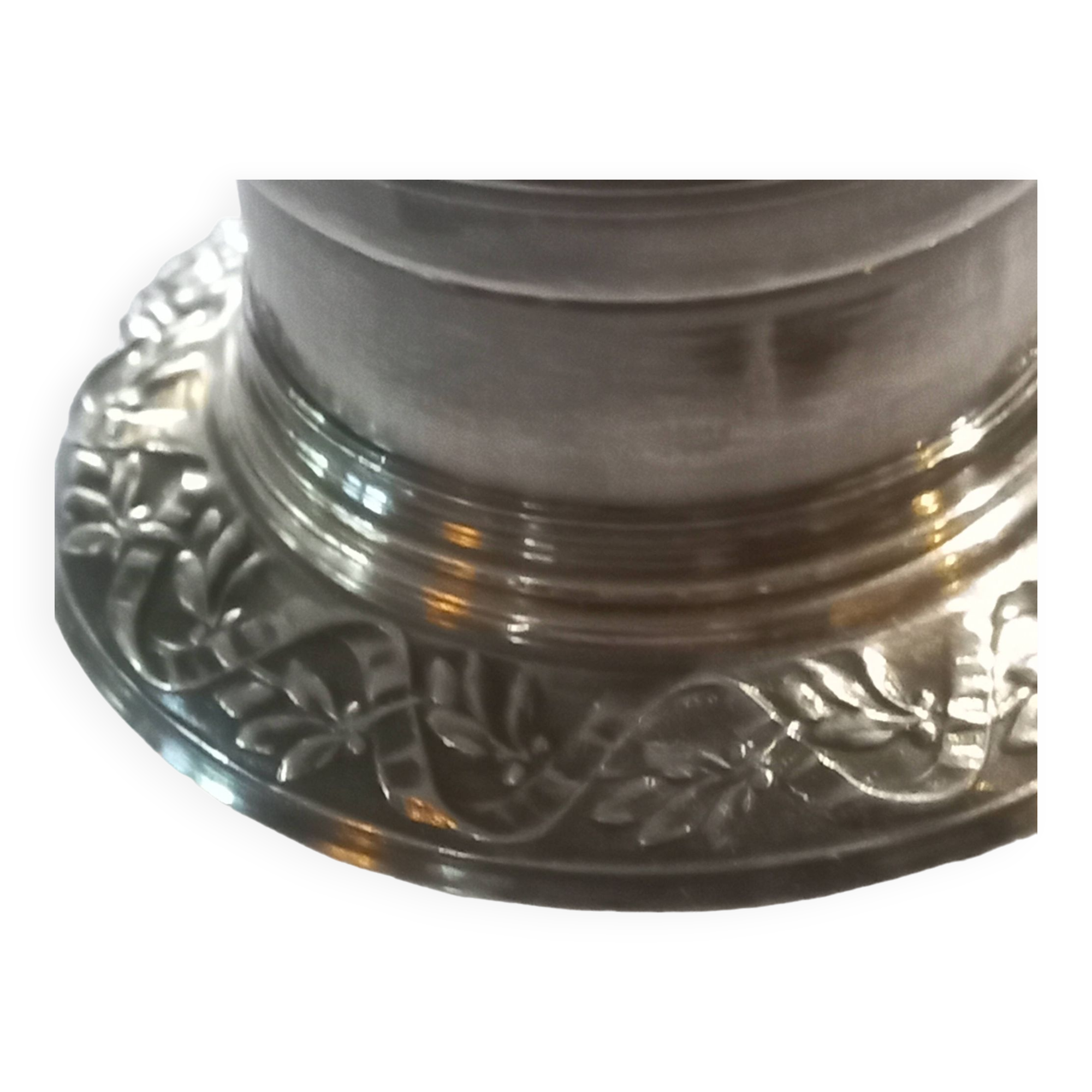 Crystal and solid silver shaker, neck brace and master's mark.