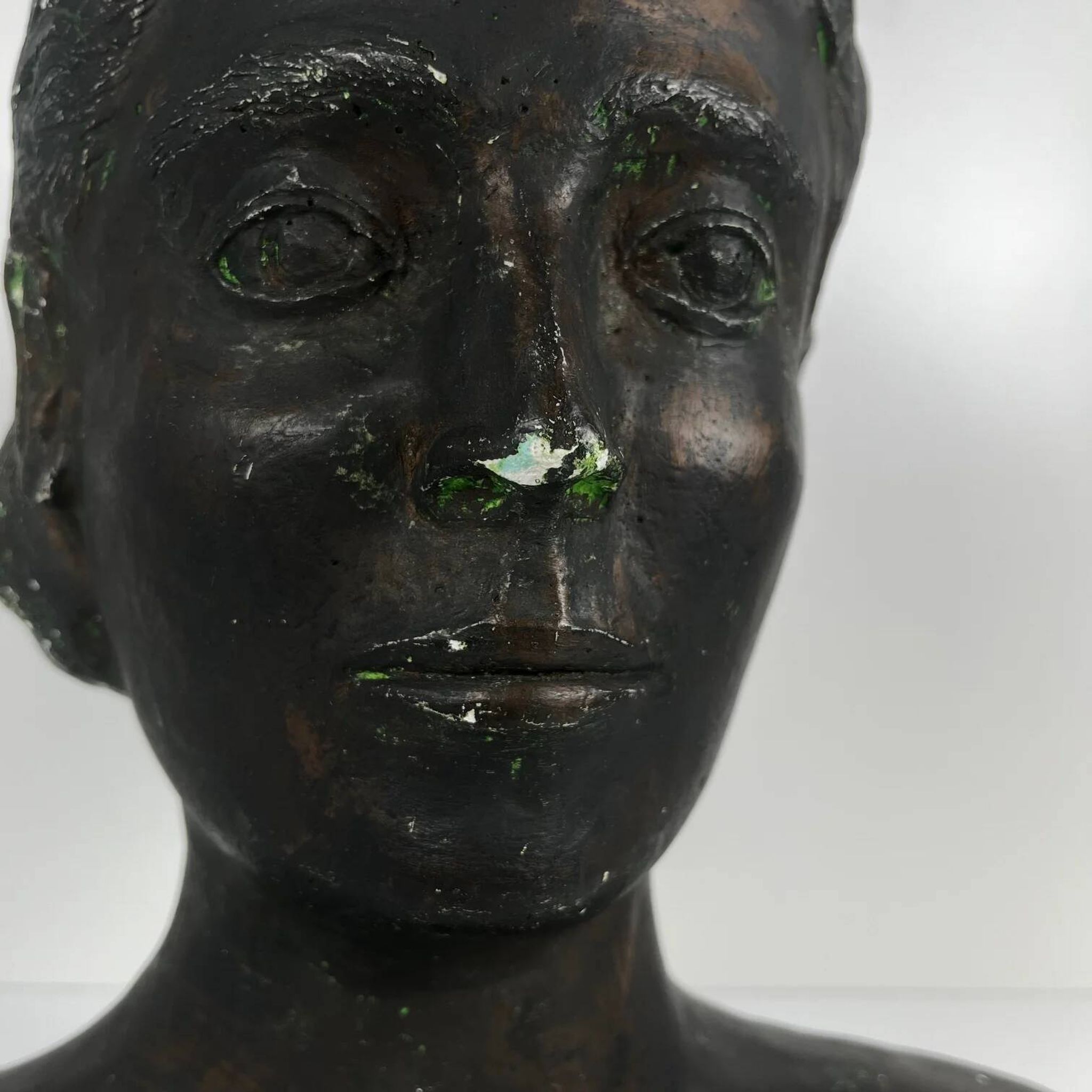 Female bust in neoclassical style in plaster by M. Mongey, 20th century.