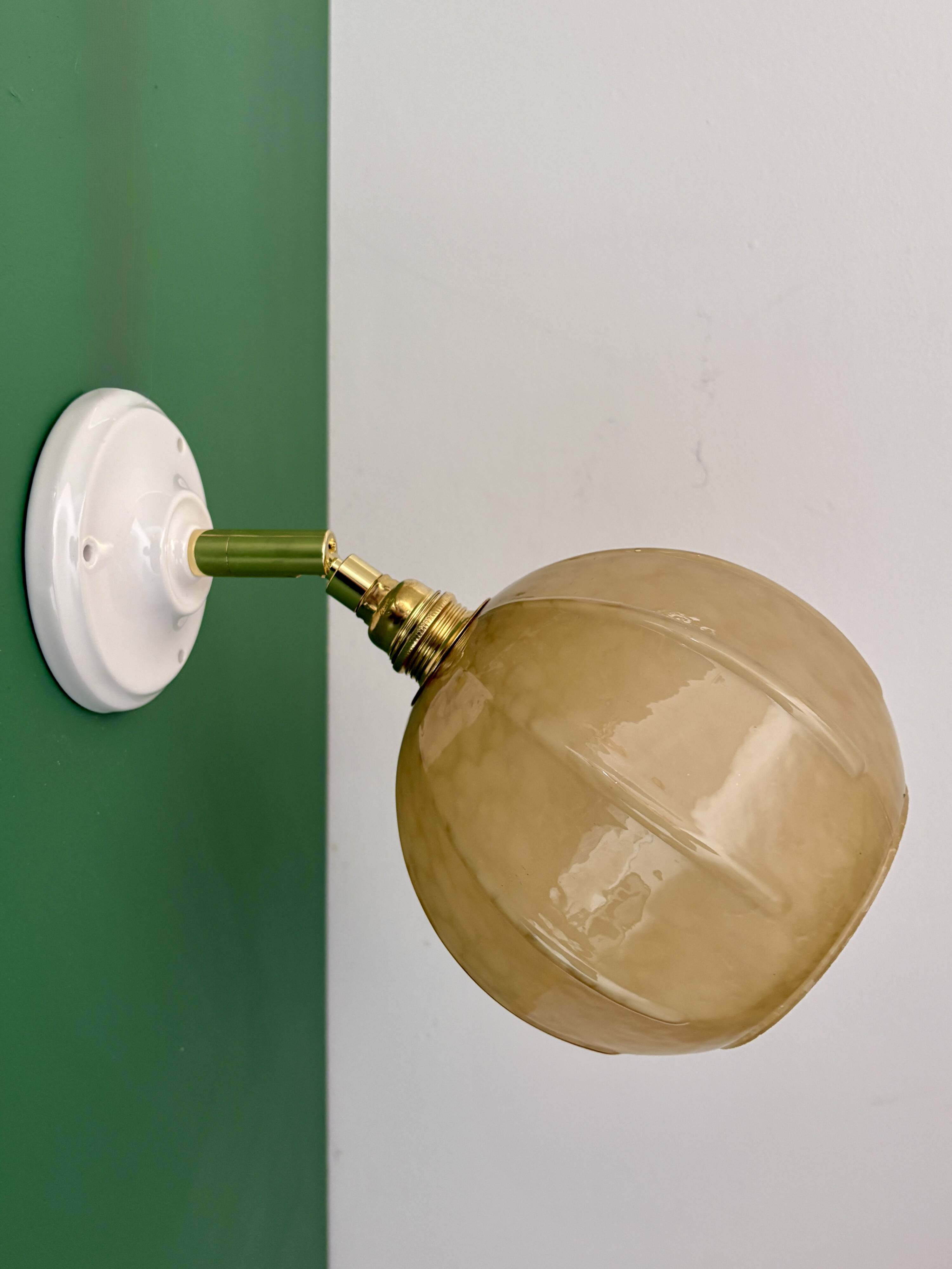 Vintage yellow glass globe wall light