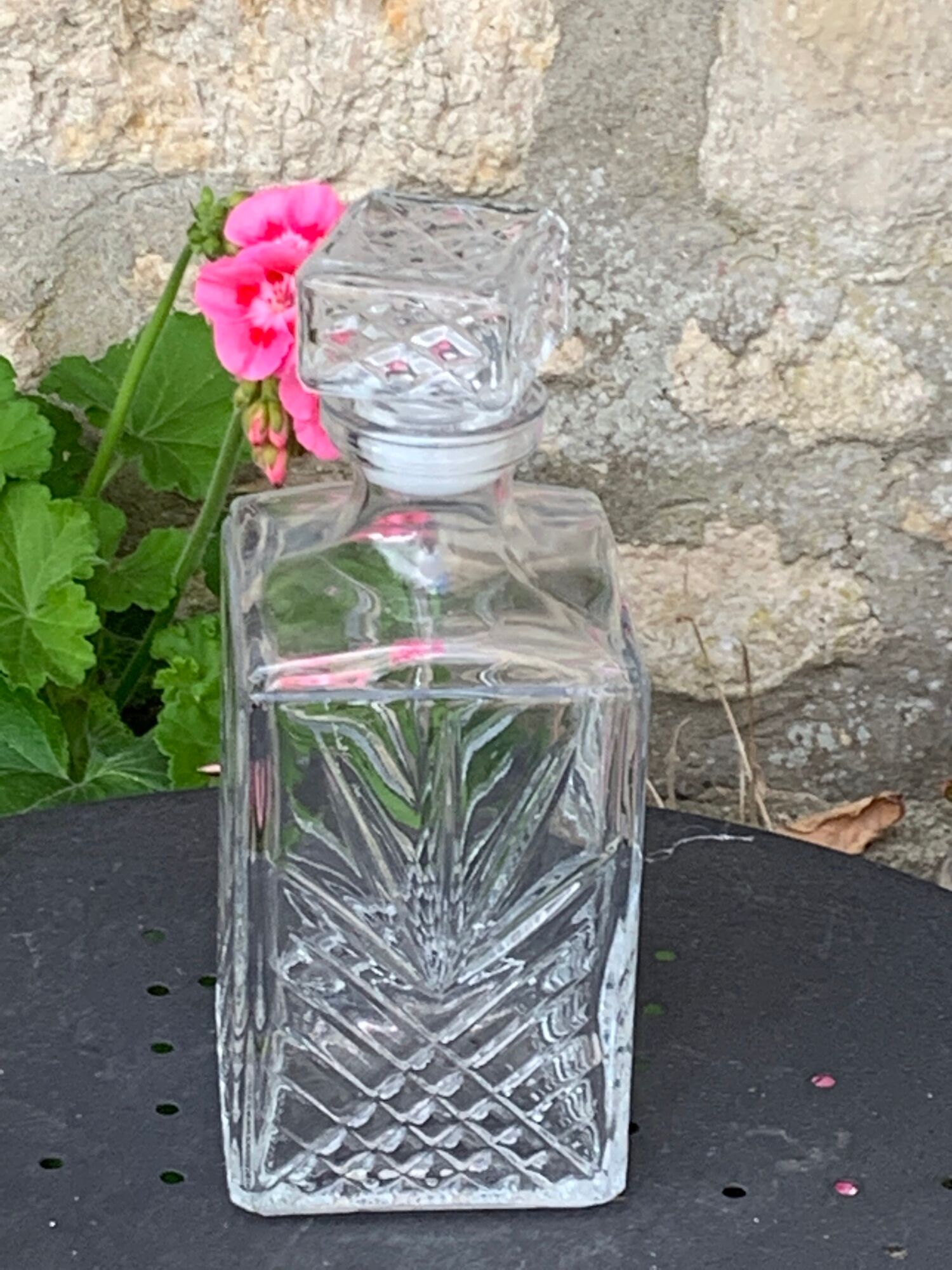 Ice bucket and whiskey decanter made of vintage chiseled transparent glass