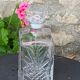 Ice bucket and whiskey decanter made of vintage chiseled transparent glass