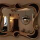 Miroir xxl néo baroque noir et doré années 80