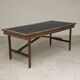 Vintage workshop folding table in oak with a hand-patinated black top.