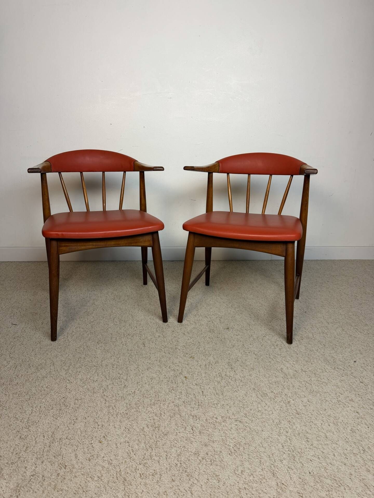 Pair of Scandinavian armchairs in teak and red faux leather – 1960s