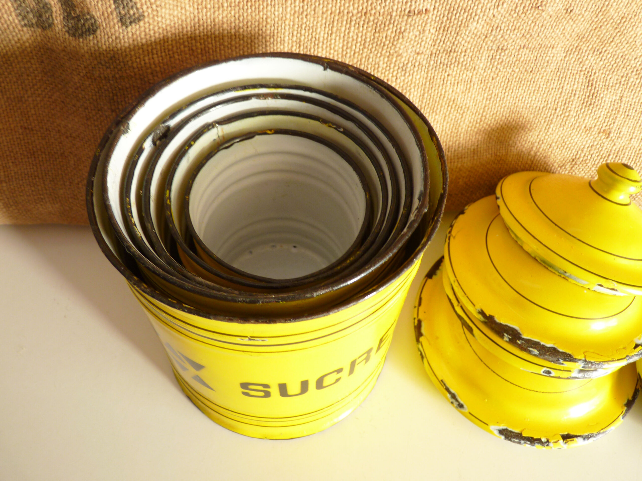 6 spice jars yellow and black enamelled sheet metal, fireplace pot