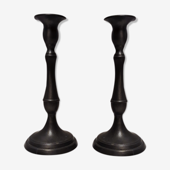 Pair of tin candlesticks