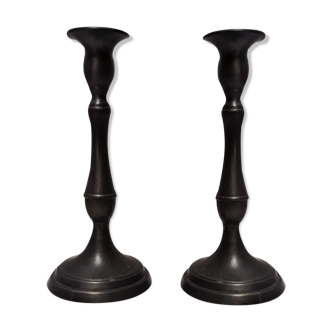 Pair of tin candlesticks