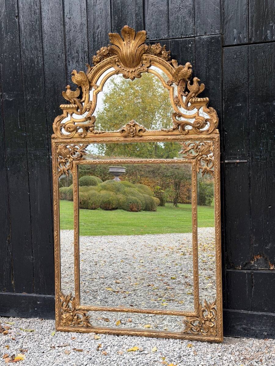 Regency style mirror in gilded wood, 19th century
