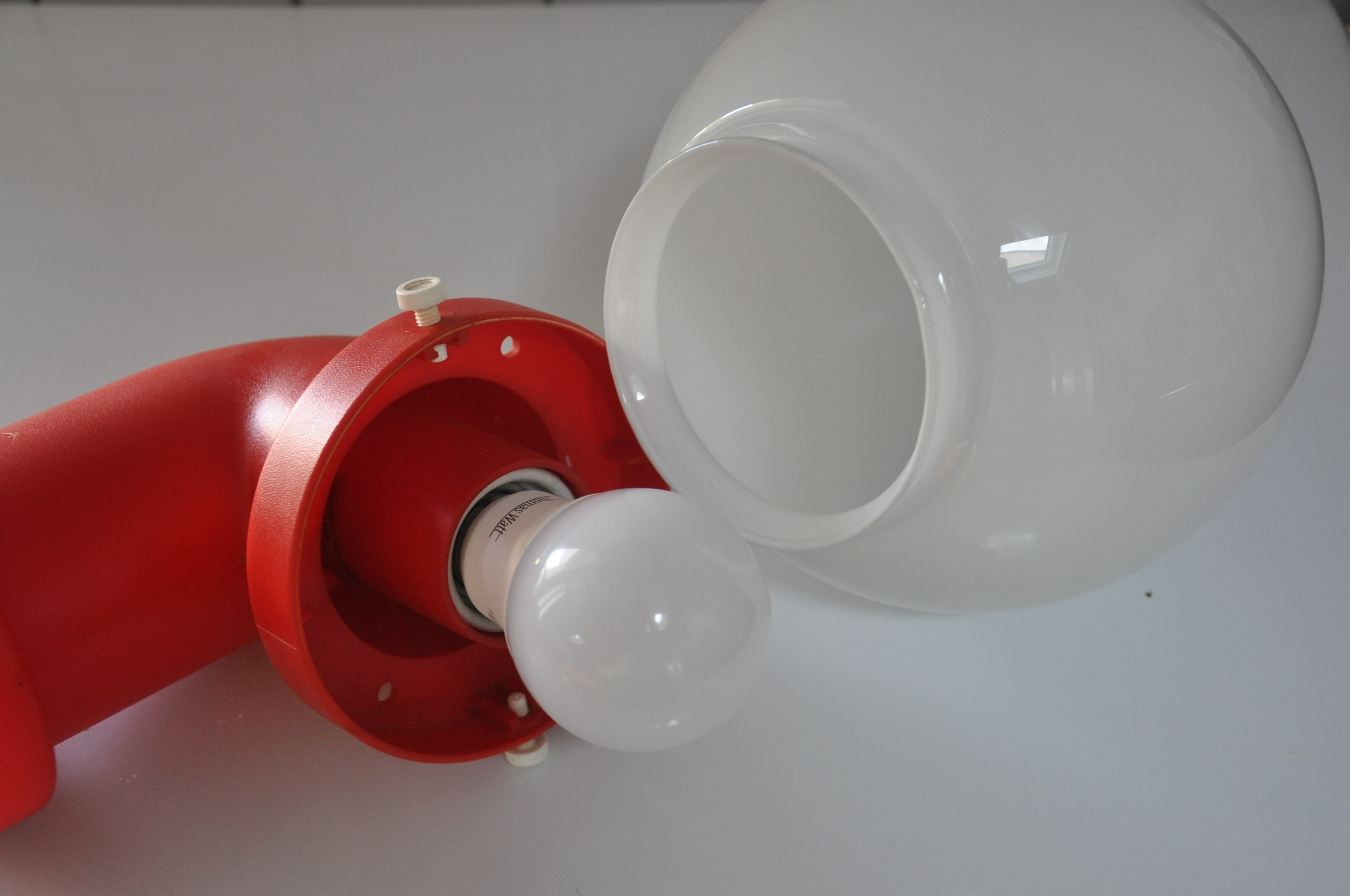 Danish wall light design indus red pipe