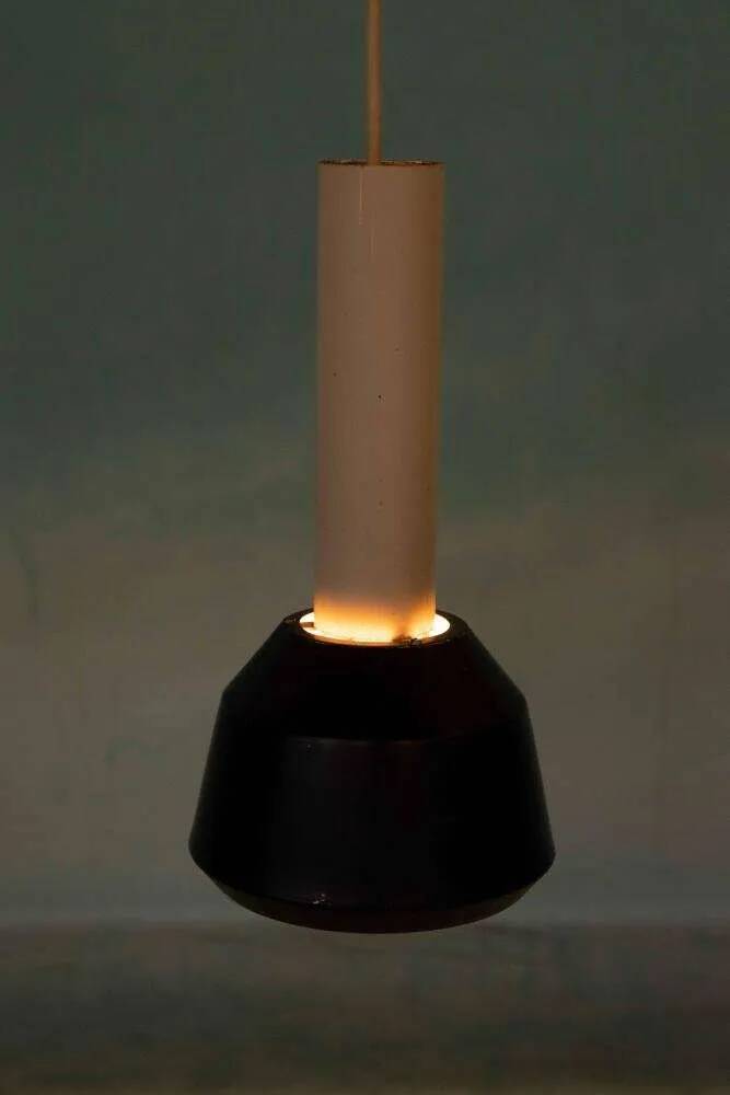 Vintage pendant light design, retro black and white ambient lamp.
