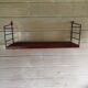 Suede string shelf