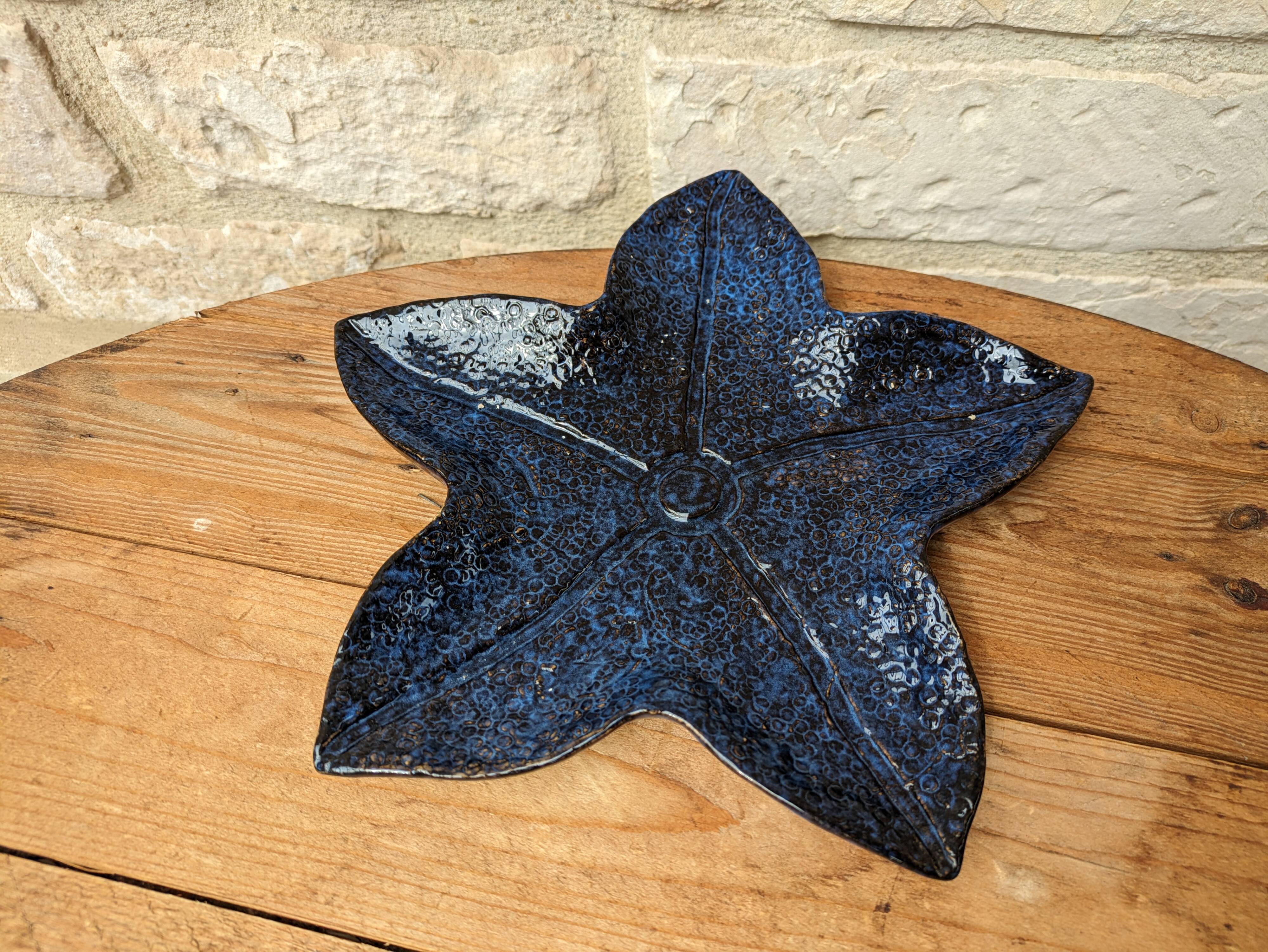 Blue ceramic starfish shaped flat plate