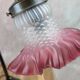 Vintage lamp with retro charm – frosted pink glass tulip
