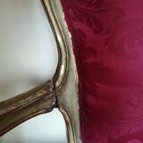 Louis XV style sofa in gilded wood and red pompadour fabric