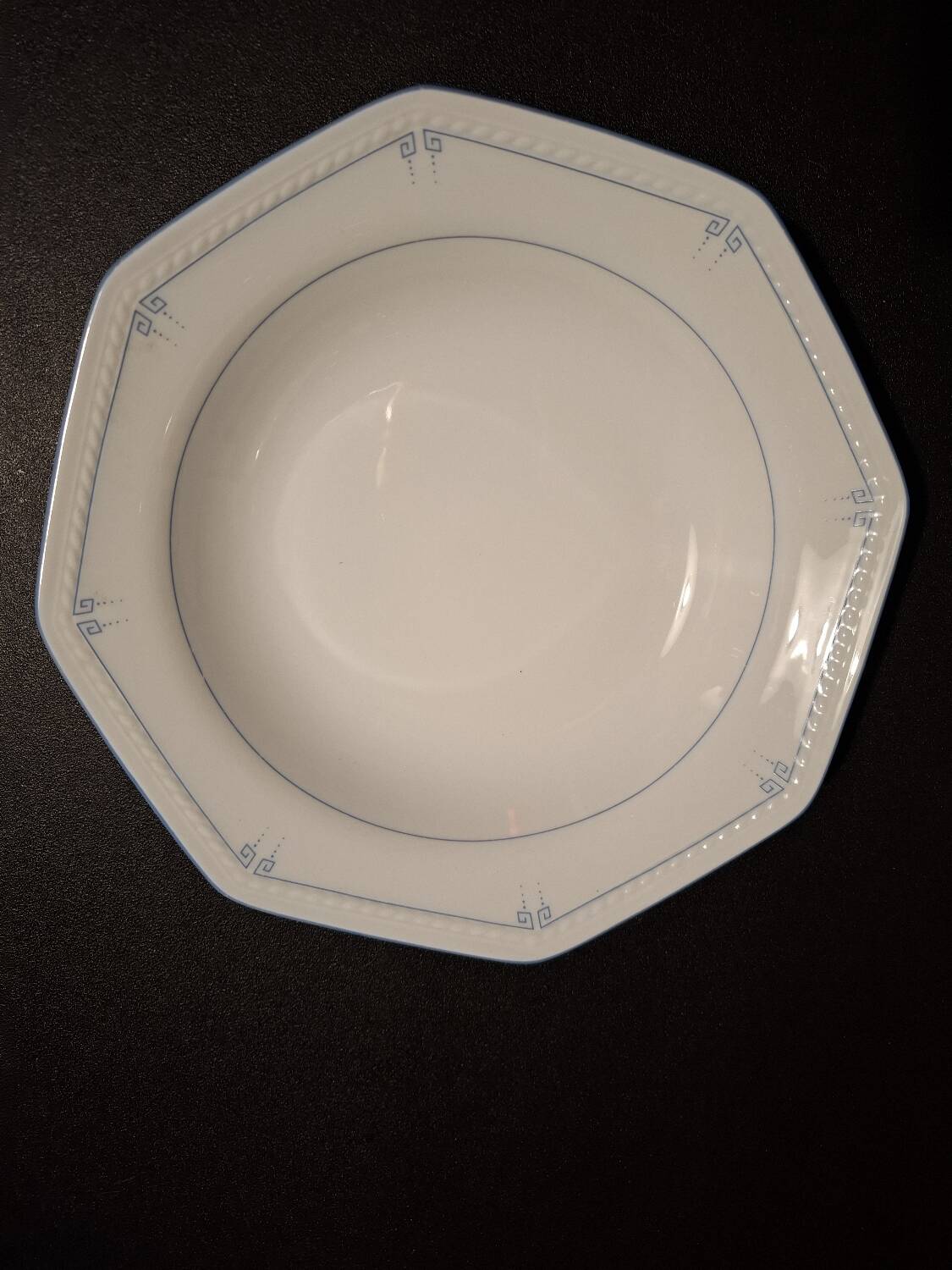 Dishes and porcelain sauceboat