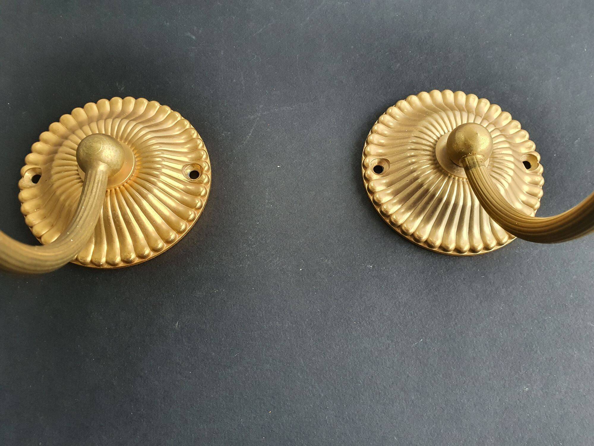Pair of vintage gold-tone wall sconces with opaline glass globes