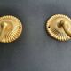 Pair of vintage gold-tone wall sconces with opaline glass globes