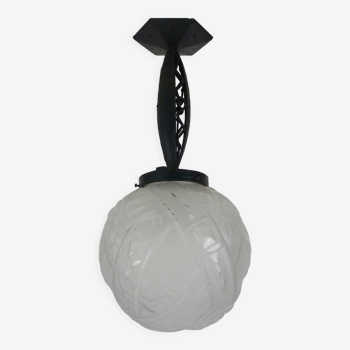 Art Deco hanging lamp in wrought iron Fournet and globe in glass paste