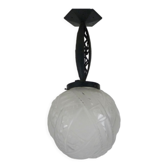 Art Deco hanging lamp in wrought iron Fournet and globe in glass paste
