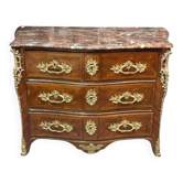 Louis XV period commode with violet wood veneer.