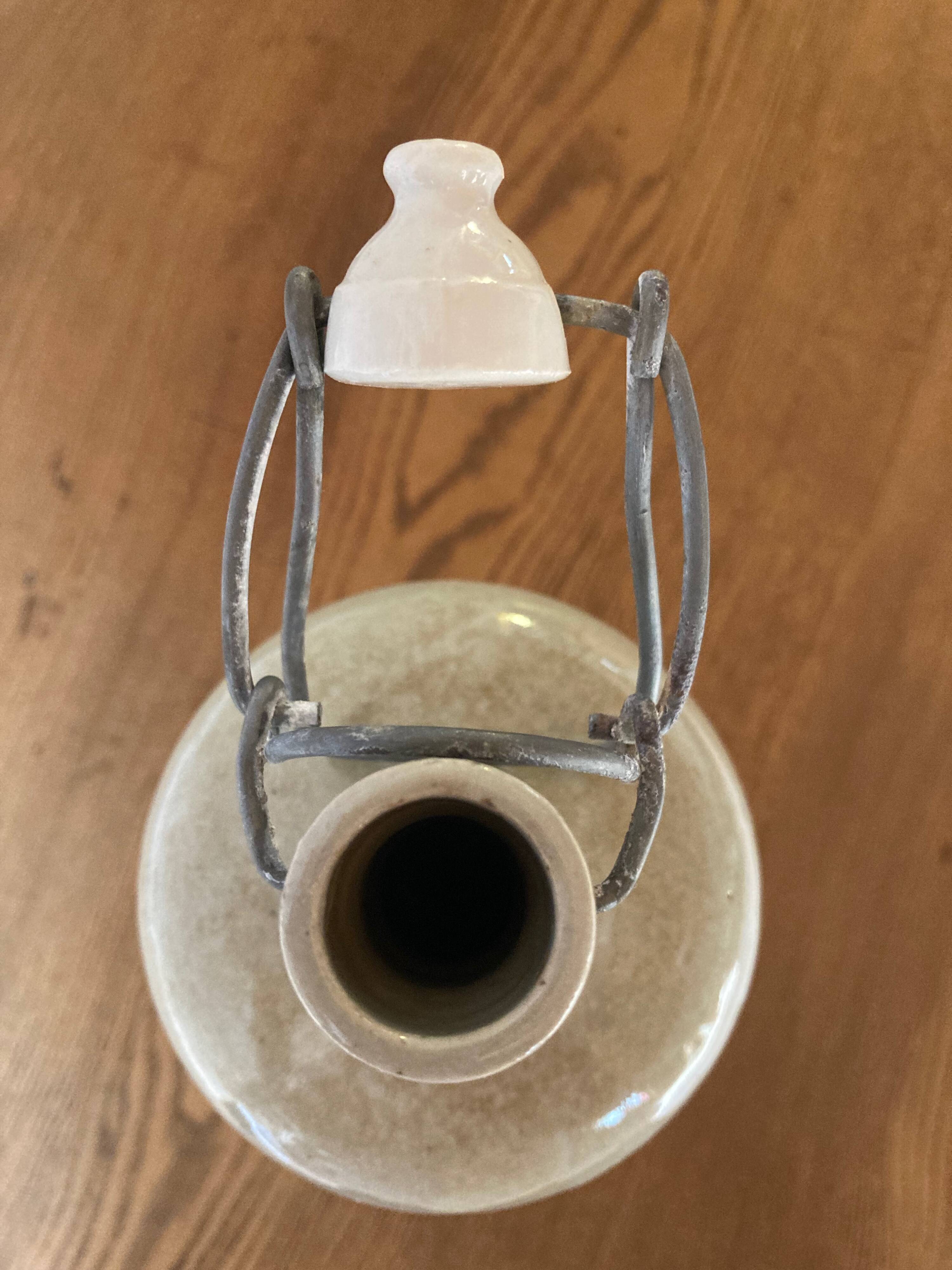 Bouteille bouillotte en grès émaillé gris clair