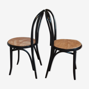 Pair of canned bistro chairs