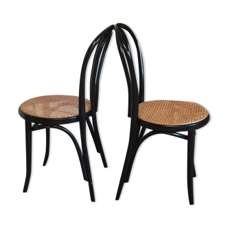 Pair of canned bistro chairs