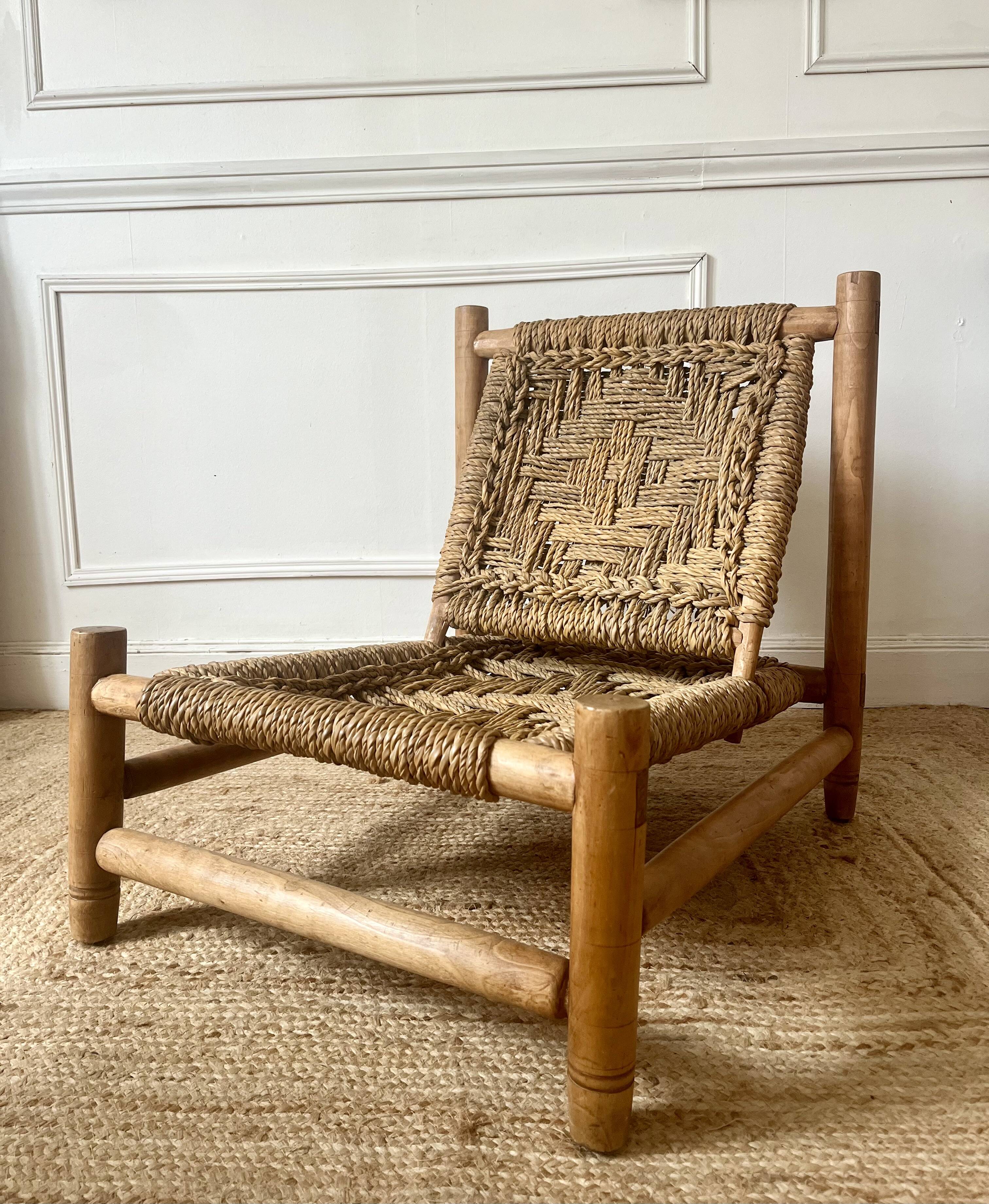 Wood and rope armchair by Audoux and Minnet from the 1950s.