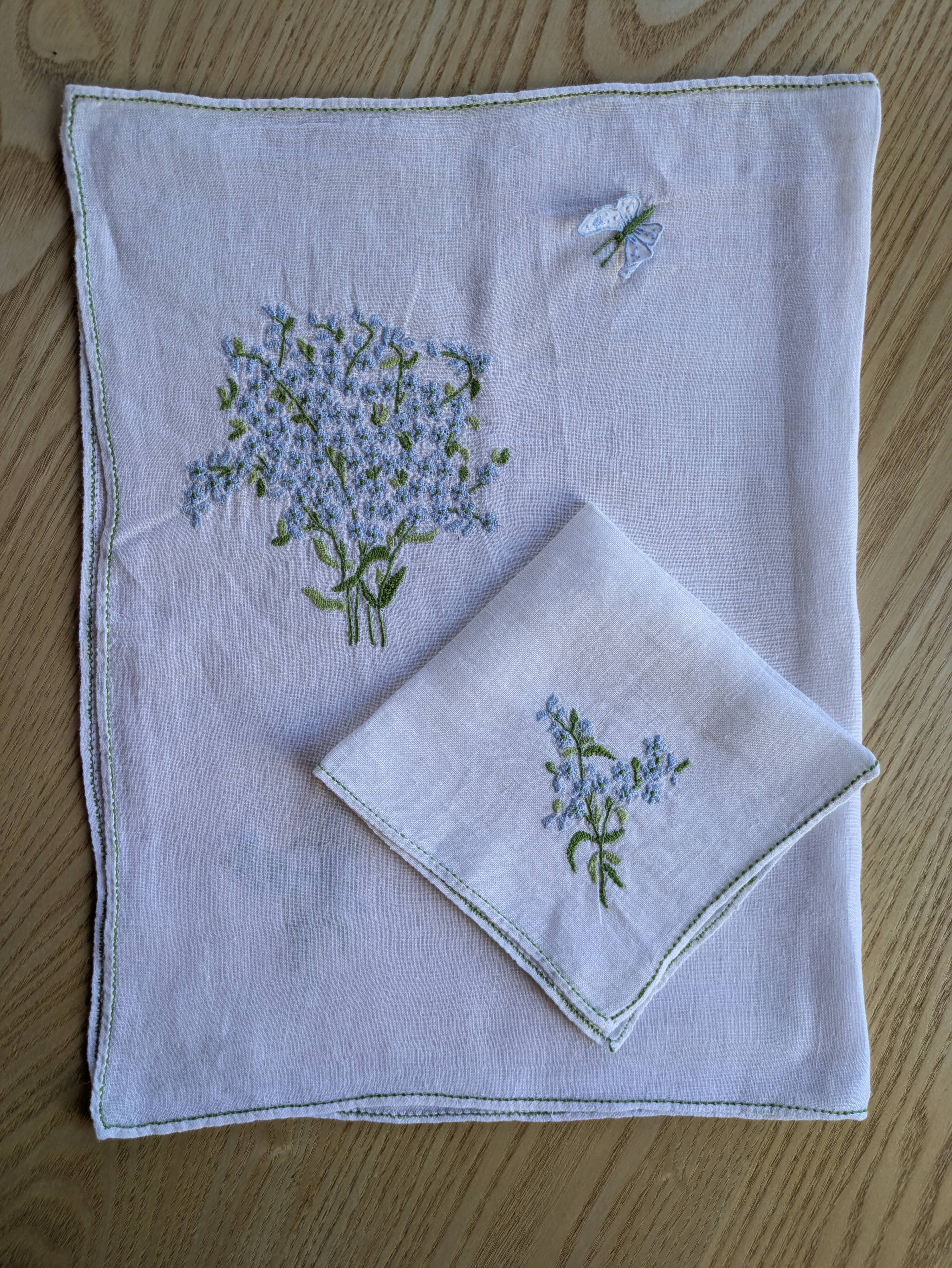 Hand-embroidered table duo in linen voile – Azure Bouquet & Butterfly